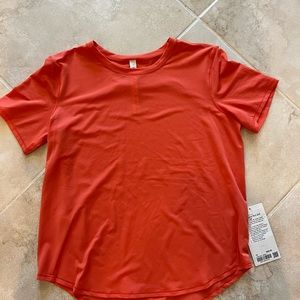 Lululemon orange size 10 NEW high neck run and train tee